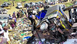 Police and rescue teams at the site of mishap in Pullumedu, 7 km from the famous Sabarimala hill shrine, in Kerala.