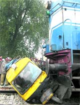 The scene of the accident at an unmanned level crossing near Teh Kalander village in Ferozepur district on Saturday.