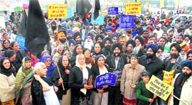 Sikhs hold a demonstration in Jalandhar on Saturday to seek justice for the families of the 1984 riot victims in Delhi.