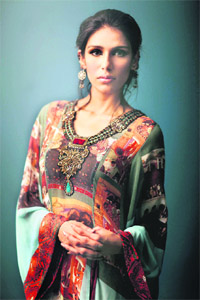 A model displays one of Ansaris creations.