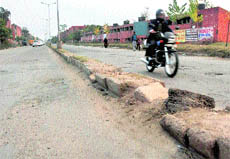 A damaged divider on a road separating Sectors 52 and 62 in Chandigarh