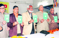 Dignitaries at the release of a book by the Hindi Sahitya Samiti in Dehradun on Sunday