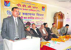 Dignitaries at a function in Dehradun on Sunday. 
