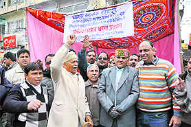 Uttarakhand Irrigation and Social Welfare Minister Matbar Singh Kandari (second from right) participates in a dharna in Dehradun on Monday.