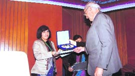Dr Ashu Chaudhary receives the Eminent Scientist of the Year Award from Padma Bhushan SZ Qasim in New Delhi.