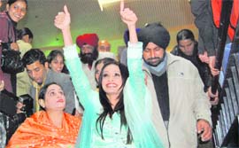 Canadian MP Ruby Dhalla signs to cheering students of BBK DAV College in Amritsar.