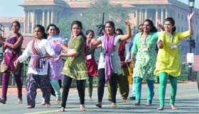 Artistes from Maharashtra practise at the R-Day rehearsal at Vijay Chowk in New Delhi on Tuesday. 