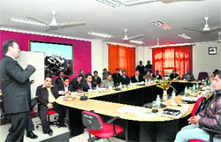 Alfons Eiligmann from Germany speaks at a workshop for officials and tour operators in Dehradun on Tuesday