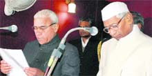 Governor Jagannath Pahadia administers oath to Justice Pritam Pal as the Lokayukta of Haryana at Raj Bhawan in Chandigarh on Tuesday.