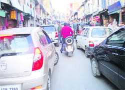 With encroachments eating into roads, such traffic jams are common at Palampur.