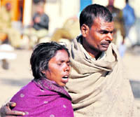 Anita and Mahesh, parents of Niranjan, whose body was found near the Ladhowal railway track, at the railway police station in Ludhiana on Wednesday