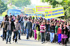 PAU students stage a protest against the governments failure to fill vacant posts in the agriculture department in Ludhiana on Wednesday