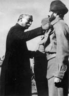 The then President, Dr Rajendra Prasad, awards the Param Vir Chakra to Lance Naik Karam Singh