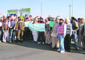 Residents of Sante Majra and Khuni Majra villages hold a protest on Wednesday