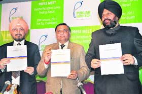 Punjab Commerce and Industry Minister Manoranjan Kalia (C) releases Investor Perception Study in Chandigarh