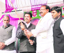 BJP MP from Hamirpur Anurag Thakur( centre) with former BJP president Venkaiah Naidu at a meeting in Faridabad on Thursday