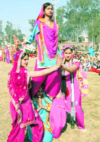 College students present a dance item for presentation at R-Day function in Kaithal.