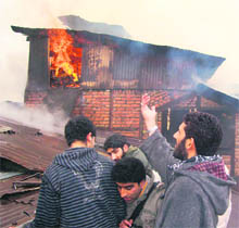 A fire that broke out in a house on the Court Road in Srinagar on Thursday