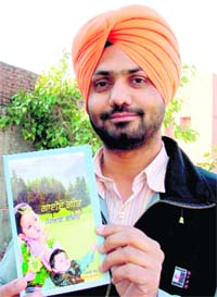 Karamjit Singh Grewal with his book in Ludhiana. Photo: Inderjeet Verma