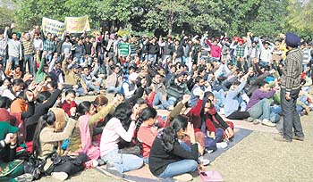 PAU students hold a rally against the state government for not filling posts of Agriculture Development Officers in the agriculture department in Ludhiana on Thursday.
