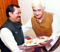 New Minister of Water Resources Salman Khursheed with Minister of State Vincent H Pala in New Delhi on Thursday.