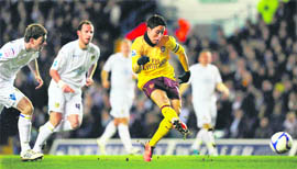 Arsenal's Samir Nasri breaks through the Leeds United defence to score during their English FA Cup Third Round replay match in Leeds on Wednesday.