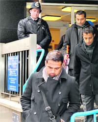 Relatives of British businessman Shrien Dewani leave the Westminster Magistrates Court after an extradition hearing in London