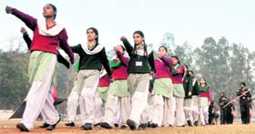 A contingent of school girls rehearses for the Republic Day function in Ludhiana on Friday.