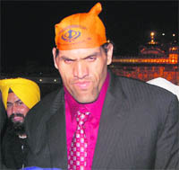 Dalip Singh (The Great Khali) pays obeisance at the Golden Temple