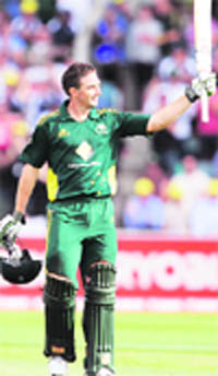 Shaun Marsh celebrates his century in Hobart 