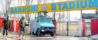 Security personnel keep a strict vigil outside the Bakshi Stadium, the official venue for the Republic Day celebrations, in Srinagar on Saturday. 