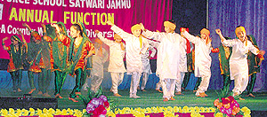 Students of Air Force School perform during the annual day celebrations on the school premises in Jammu on Saturday. 