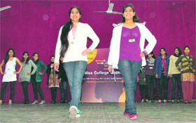 Students walk the ramp during the Miss College auditions at the Government College for Women in Ludhiana on Saturday.