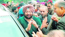 Amarinder Singh interacts with supporters in Ludhiana on Saturday.