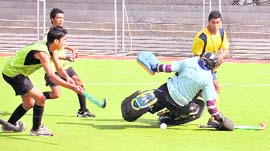 Players in action in the Balwant hockey tournament in Jalandhar on Saturday.
