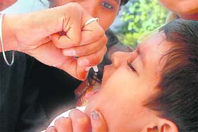 A child being administered the polio vaccine as part of a government campaign to eradicate the disease in Chandigarh