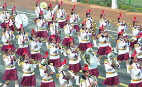 Students from Pilani School perform during the full-dress rehearsal for the Republic Day Parade in New Delhi on Sunday.