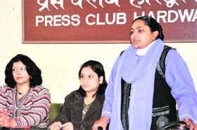 Women painters address the media in Haridwar