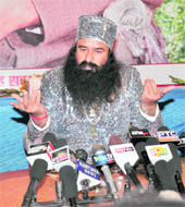 Dera Sacha Sauda chief Gurmeet Ram Rahim Singh talks to mediapersons at Sirsa on Sunday. 