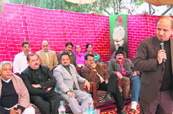 Deputy Chief Minister Tara Chand addresses a function in connection with the birth anniversary of Netaji Subhas Chander Bose in Jammu on Sunday.