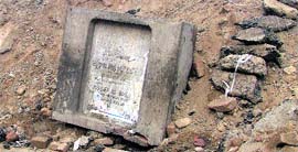 Foundation stone of Bhadaur House lying in debris.