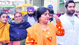 Dolly Bindra of Big Boss fame visits the injured at SPS Hospital in Ludhiana on Sunday.