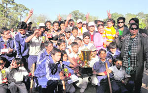 The members of the Little Masters Club team with the 25th Late Banke Lal Shah Memorial Cricket Tournament in Dehradun on Monday.