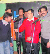 The members of local rock band Lok Dhwani record a patriotic song in Dehradun on Monday. 