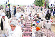 Villagers block the rail track in Jind