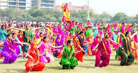 Schoolchildren during their rehearsal for the Republic Day function at Tau Devi Lal Stadium in Gurgaon.