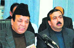Abdul Rahim Rather, Finance Minister (left) addresses mediapersons in Jammu