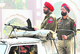 Policemen keep a tight vigil near Guru Nanak Stadium in Amritsar on Tuesday.