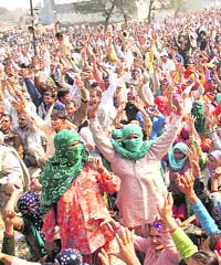 Villagers block the rail track in Jind