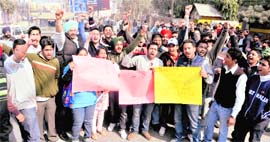 Law students of Panjab University stage a protest in Ludhiana.